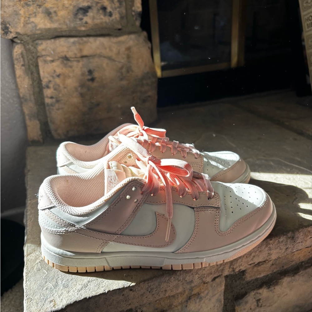 Nike dunks in pale pink